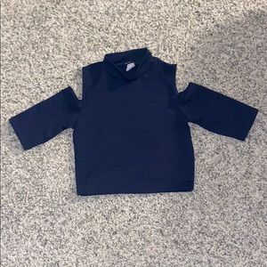 A Shoulder cut out turtle neck